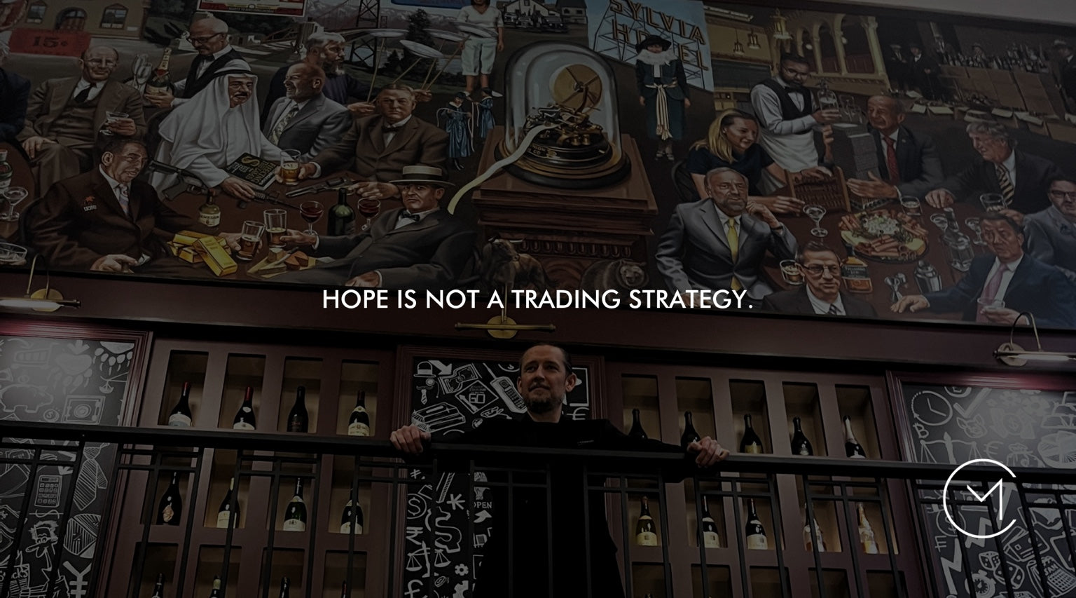 A man stands beneath a large financial-themed mural, illustrating the trading principle that hope is not a strategy.