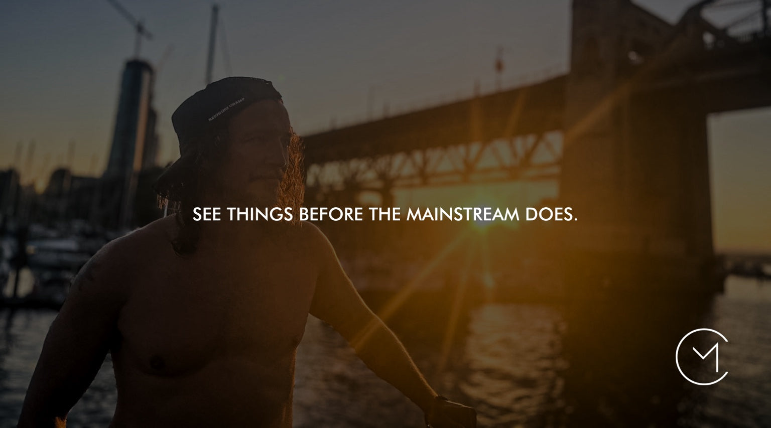 A man looks toward the horizon at sunset, illustrating future thinking and seeing possibilities before they become mainstream.