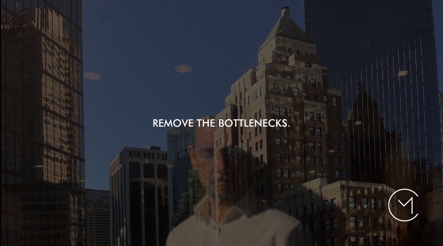 A city skyline reflected in glass with a person visible in the foreground, illustrating a business growth strategy focused on removing bottlenecks.